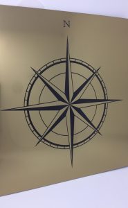 The Altered State -laser engraved laser etched compass design on engraving laminate