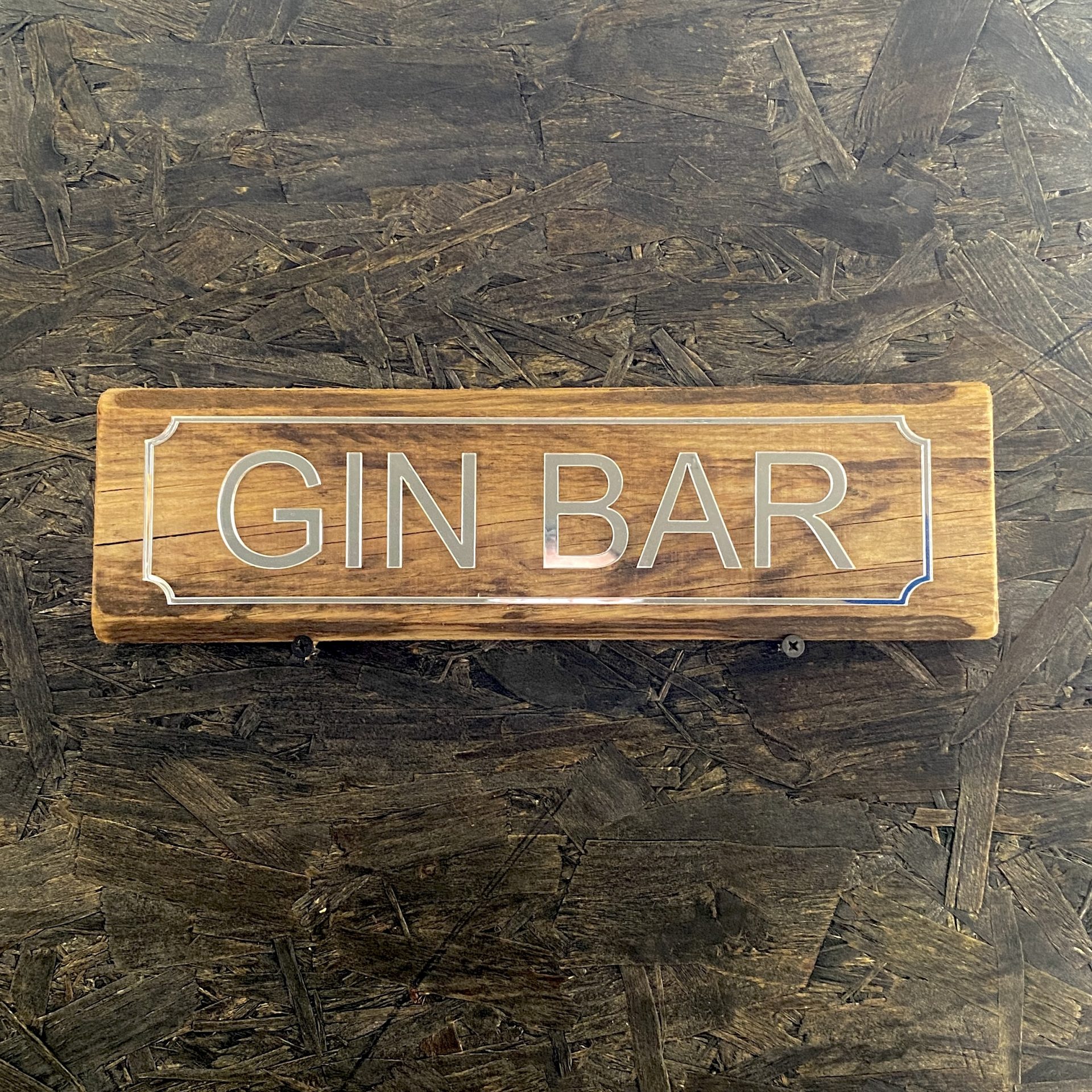 Gin Bar sign with silver mirror acrylic lettering and a reclaimed pallet wood base
