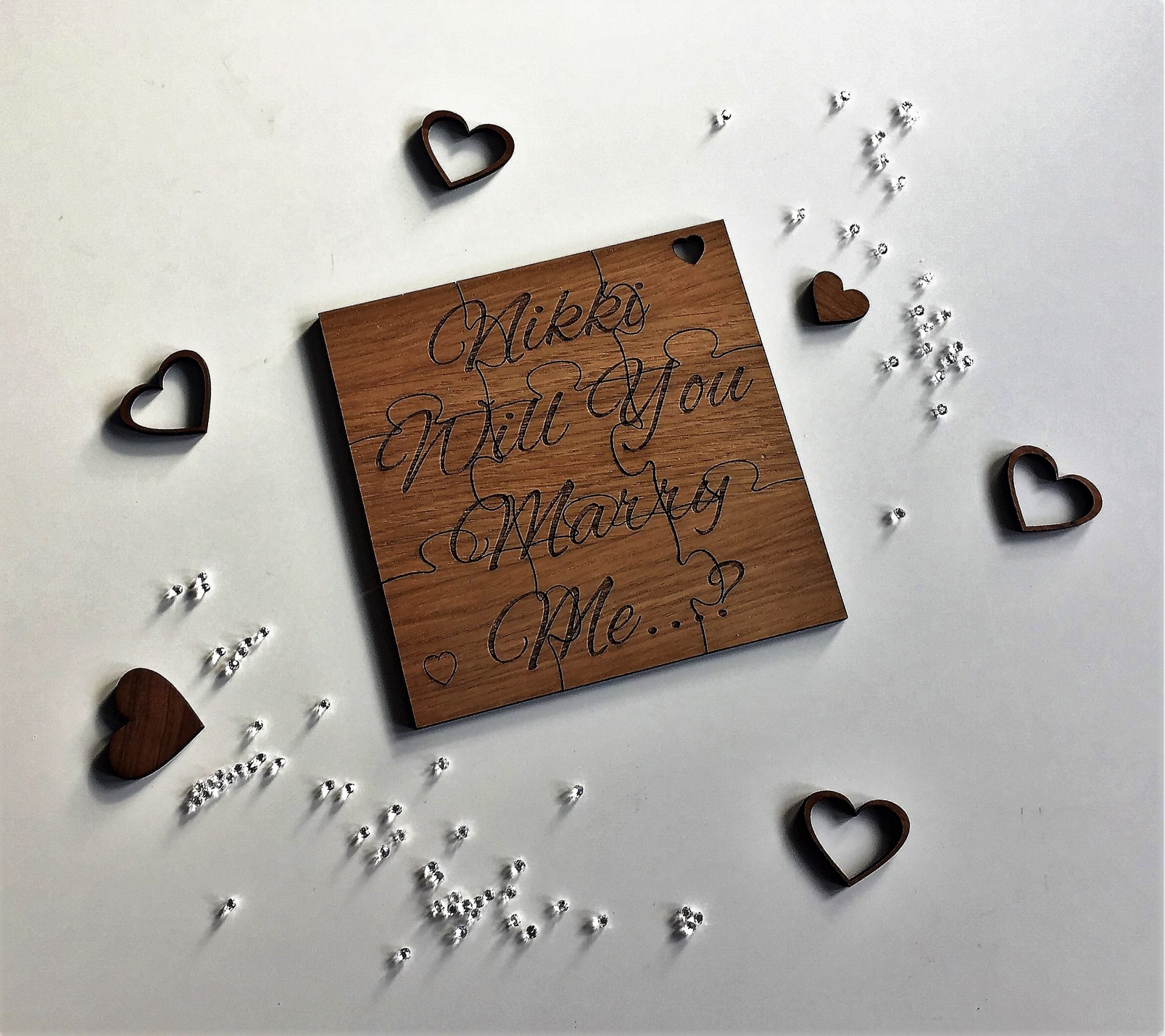 wooden proposal jigsaw with laser engraved message by ellie and hart