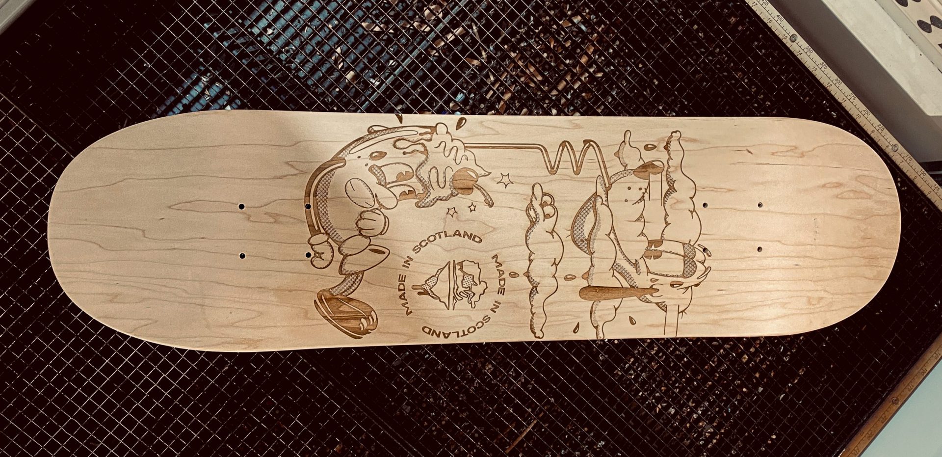 laser engraved skate board cruiser style with bespoke artwork for the bonny co by the altered state
