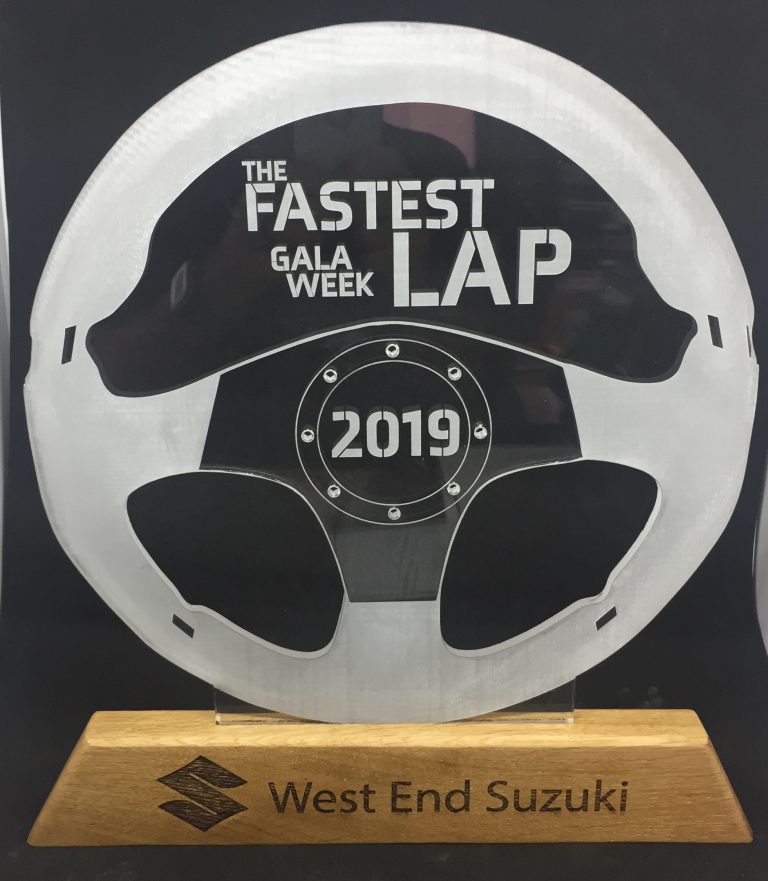 bespoke acrylic and oak wood steering wheel trophy for west end suzuki in broughty ferry for gala week laser cut and engraved by the altered state