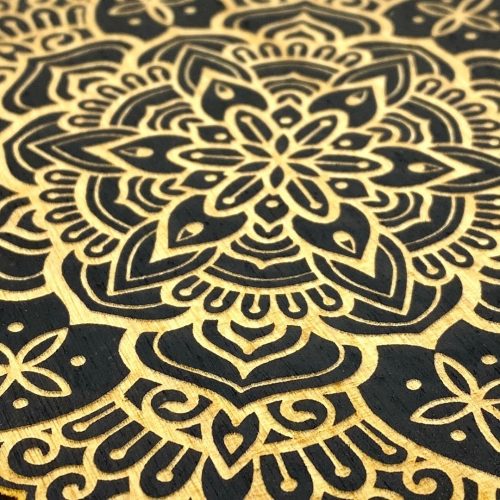 Laser-engraved-mandala-on-black-plywood
